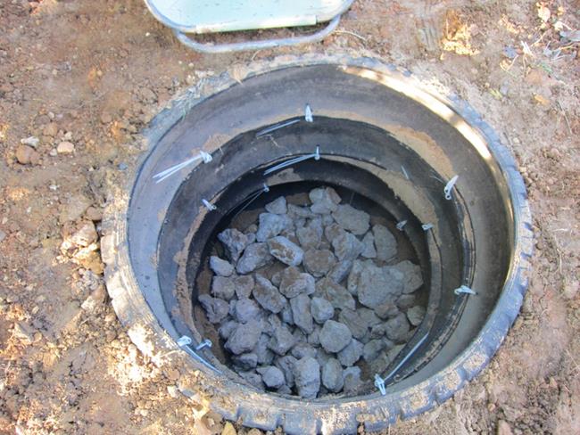 Проницаемая выгребная яма из бетонных колец